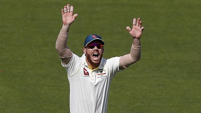 David Warner in the unfamiliar role of slip during the All-Australian clash in Southampton on Tuesday. Picture: Getty Images