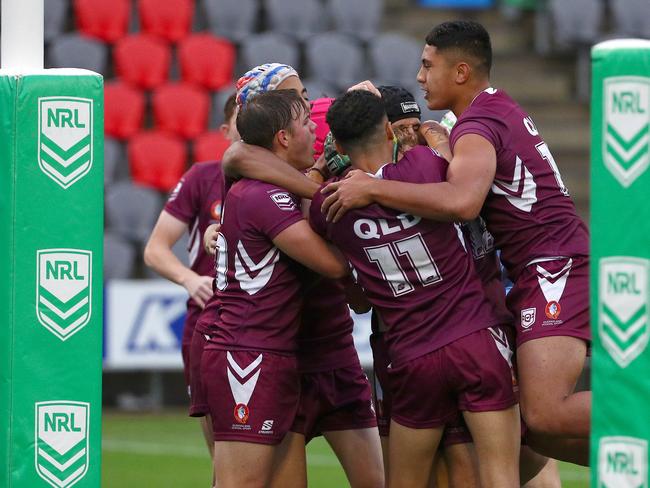 Action from the Australian state schools national rugby league championship match between Queensland Maroon and NSW CHS. QLD celebrates after Marley Mclaren scored a try. Picture: Tertius Pickard