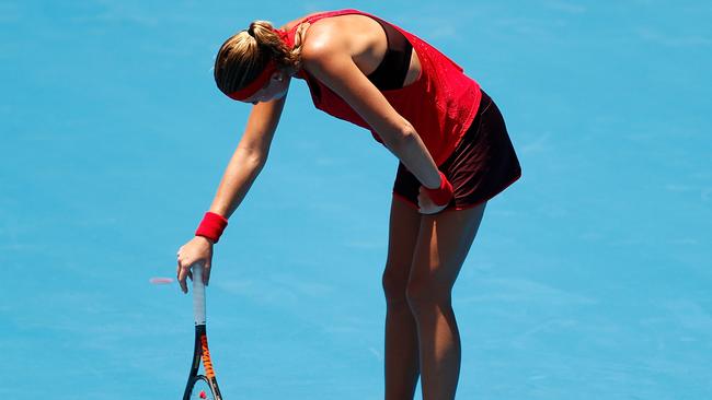 Kristina Mladenovic succumbs to the heat at the Sydney International.