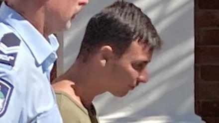 Cruize Thomson, 20, is escorted from Gympie District Court on Thursday, May 4, 2023, after pleading guilty to a dozen charges over an October 2021 burglary at Kingaroy, and a November 2021 "rampage" at his Tin Can Bay home in which he threatened neighbours with a knife, and bashed and cut his mother.