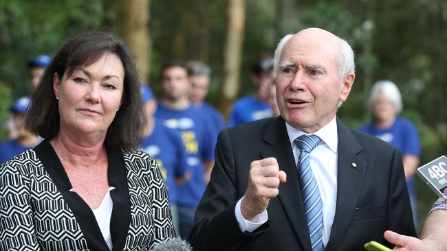 Former Prime Minister John Howard joins Tarnya Smith on the campaign trail in Queensland. Photo: Annette Dew