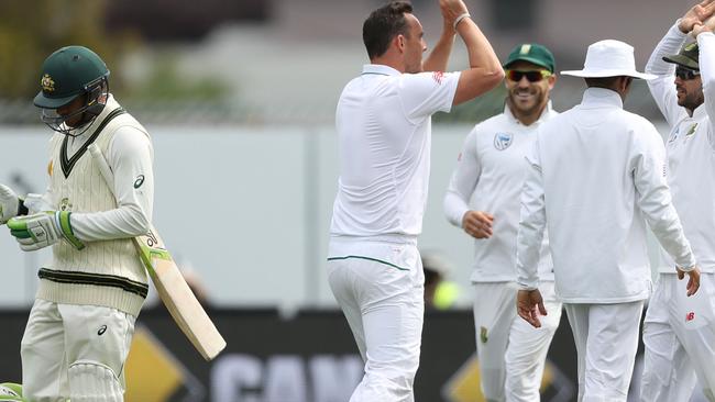 HOBART, AUSTRALIA - NOVEMBER 15: Kyle Abbott of South Africa celebrates after taking the wicket of Usman Khawaja of Australia during day four of the Second Test match between Australia and South Africa at Blundstone Arena on November 15, 2016 in Hobart, Australia. (Photo by Robert Cianflone/Getty Images)