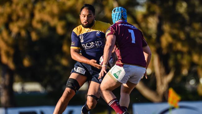 Zach Moimoi runs the ball for Bond University during the Queensland Premier Rugby season. Picture: Stephen Tremain