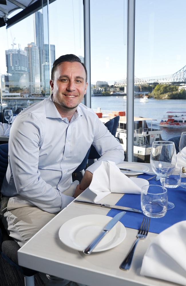 Michael Tassis, owner of Georges Paragon Seafood Restaurant, Rico Bar and Dining and Massimo posing at Georges Paragon. Picture: Josh Woning