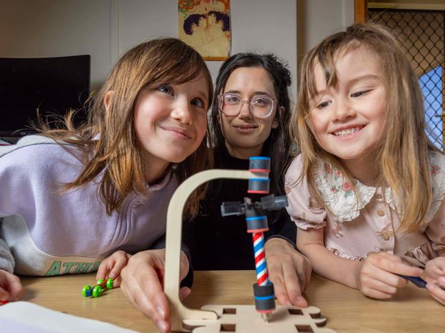 Bekah with her daughters, Luna , 8 (grade 1) and Lottie 6, (reception) at their home in Whyalla SA. Pictured on 26th September 2024. Picture: Ben Clark