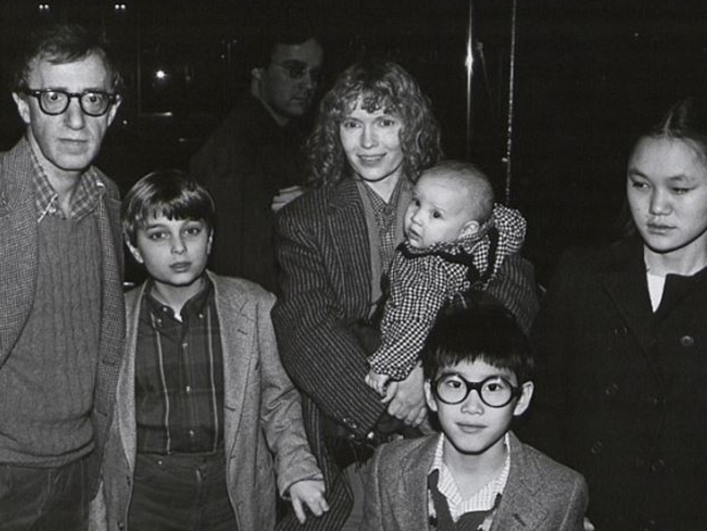 Woody Allen and Mia Farrow (holding baby Dylan) with Soon-Yi Previn (right) in 1986. Picture: Supplied