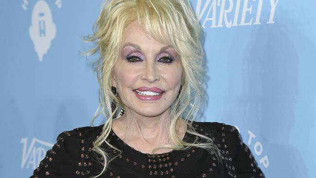 ”Can’t you just read between my lines?” I whimpered ... Yeah right. And Dolly Parton is ageing naturally. Photo: Jordan Strauss/Invision/AP