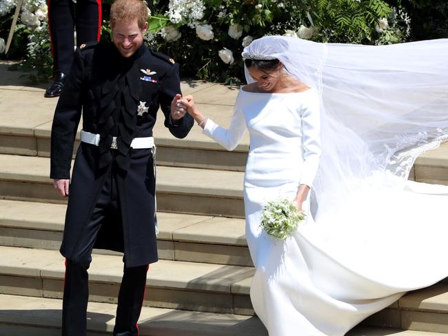 A trip down the steps of St George’s Chapel. Picture: AFP