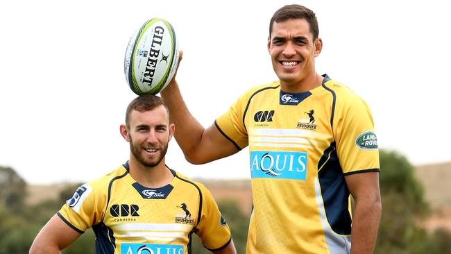 ****** DONT USE without permission of Daily Tele sports editor Adam Mobbs ***** Brumbies halfback Nic White with New Brumbies lock Rory Arnold, tallest player in Super Rugby at 208cm. At Brumbies Headquarters in Canberra.