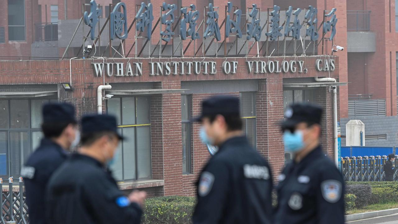 Security personnel stand guard outside the Wuhan Institute of Virology in Wuhan. Picture: Hector Retamal/AFP