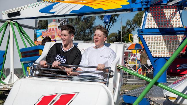 Ryan Dalzell (left) and Noah Burke in sideshow alley.Heritage Bank Toowoomba Royal Show.Friday April 19th, 2024 Picture: Bev Lacey