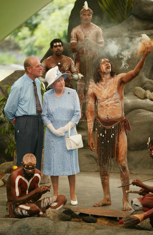 The Queen and Prince Philip meet with Indigenous performers in Cairns in 2002. Picture: AFP