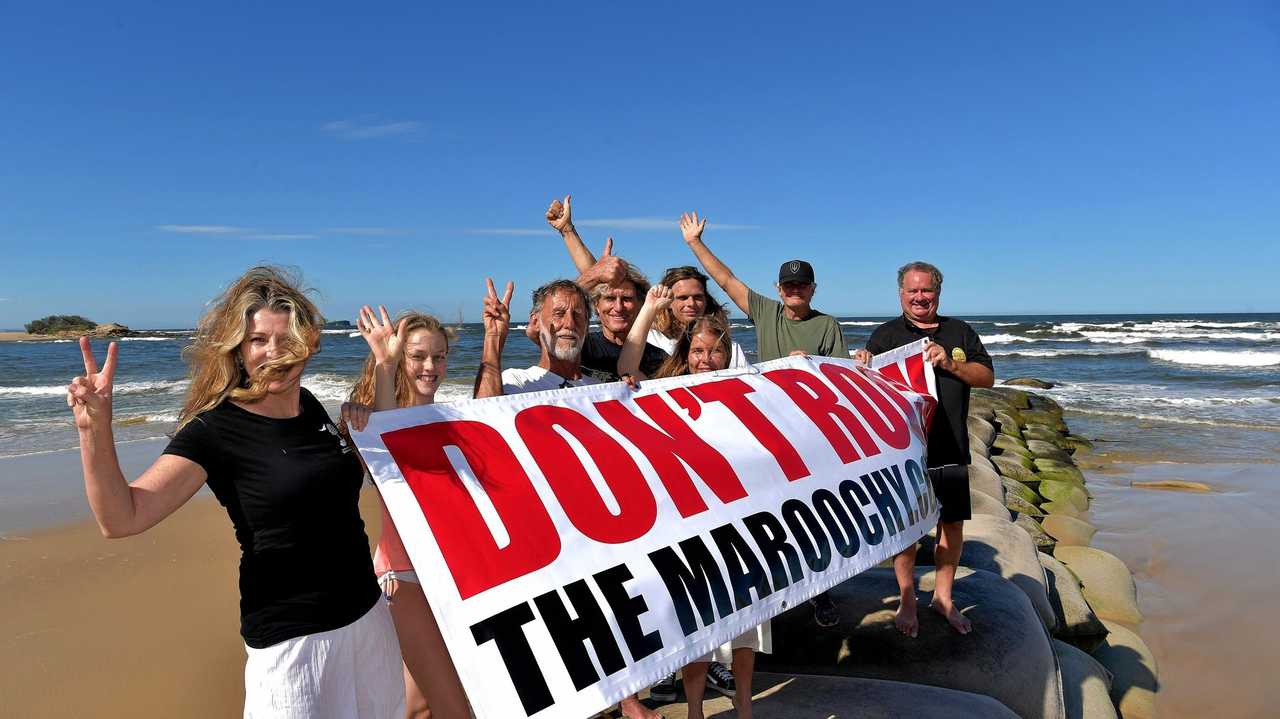 HARD FOUGHT: Local residents celebrate the decision not to build a rock wall on the Maroochy River. Picture: Warren Lynam