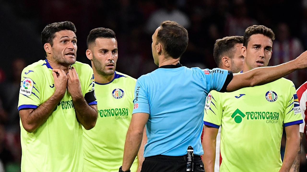 Getafe's Spanish forward Jorge Molina (L) was sent off in a bizarre VAR decision. (Photo by JAVIER SORIANO / AFP)