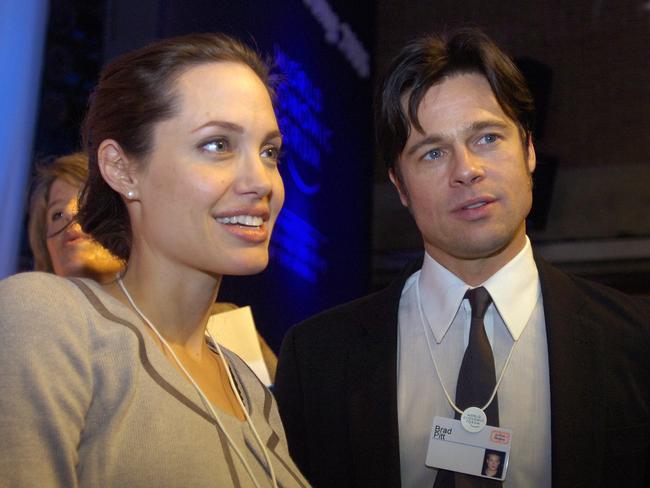 2006: Angelina Jolie and Brad Pitt attend the World Economic Forum in Davos, Switzerland. Picture: AP