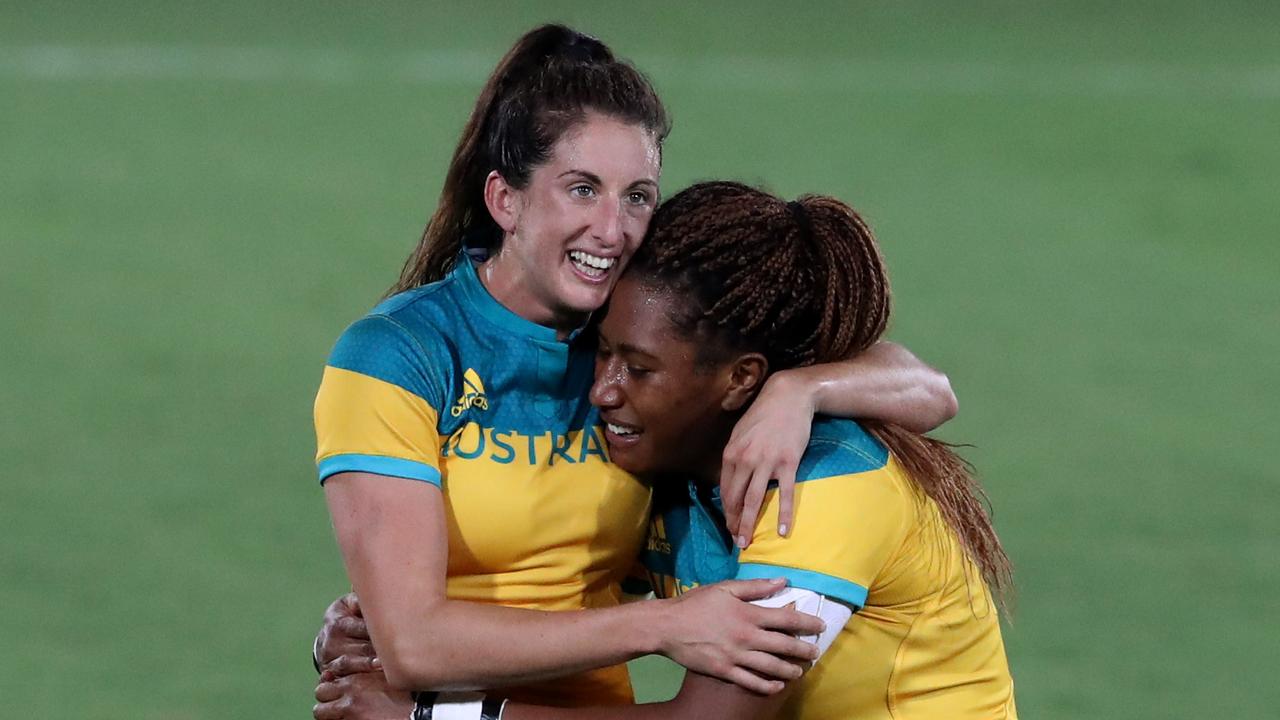 Alicia Quirk and Ellia Green celebrate winning gold in the 2016 Rio Olympic Women's Rugby Sevens. The sport could soon be dumped from the Olympics.