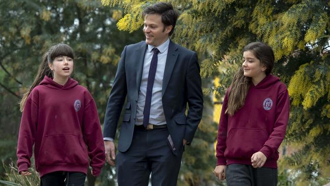 Preston High students Harriet and Scarlett, with the school’s inaugural principal Sean Butler, ahead of the school’s opening. Picture: Andy Brownbill