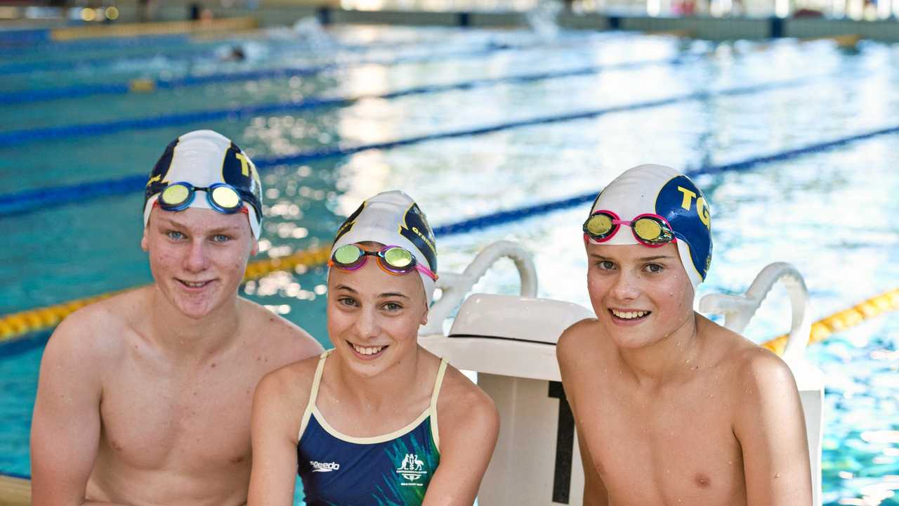 STATE TITLES: Swimmers (from left) Henry Reardon, Hannah Pollock and Hugh Pollock will be part of Toowoomba Grammar Swimming Club's big team heading to the state championships later this month. Picture: Kevin Farmer