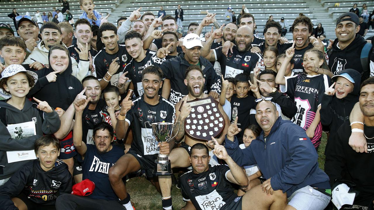 Redfern All Blacks A-Grade celebrate their victory. Picture: John Appleyard