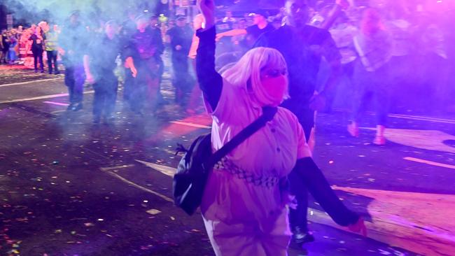 She and many other marchers in the group wore face coverings. Picture: NCA NewsWire / Jeremy Piper