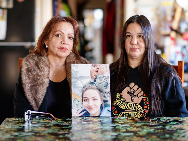 Grandmother Mandy Brown and mother Courtney Hunter-Hebberman holding a photograph of Rose. Picture: Matt Turner