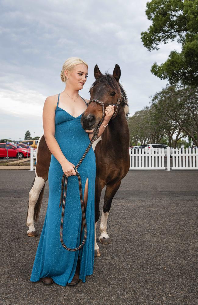 Graduate Caoilainn Finn with Murphy at The Industry School formal at Clifford Park Racecourse, Tuesday, November 12, 2024. Picture: Kevin Farmer