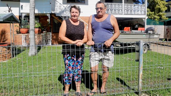 Gloria McNamara and Steve Schatkowski prepare for flood inundation under their Wharf St home in Depot Hill. Picture: Tim Marsden