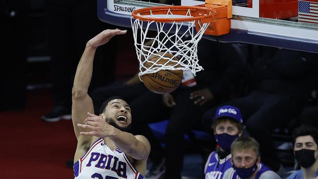 PHILADELPHIA, PENNSYLVANIA - JUNE 20: Ben Simmons #25 of the Philadelphia 76ers dunks during the third quarter against the Atlanta Hawks during Game Seven of the Eastern Conference Semifinals at Wells Fargo Center on June 20, 2021 in Philadelphia, Pennsylvania. NOTE TO USER: User expressly acknowledges and agrees that, by downloading and or using this photograph, User is consenting to the terms and conditions of the Getty Images License Agreement.   Tim Nwachukwu/Getty Images/AFP == FOR NEWSPAPERS, INTERNET, TELCOS & TELEVISION USE ONLY ==