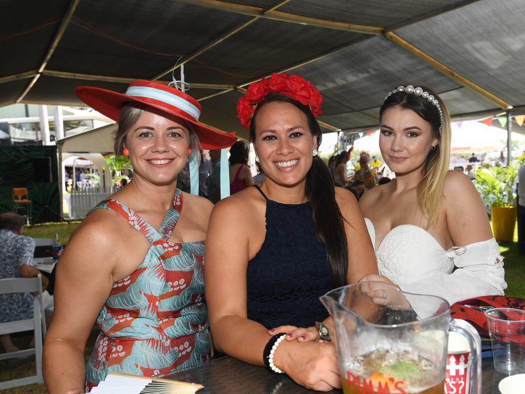 Kiri Marchall, Christine Stewart and Lizzie Bertossa enjoy the 2019 Darwin Cup. Picture: KATRINA BRIDGEFORD