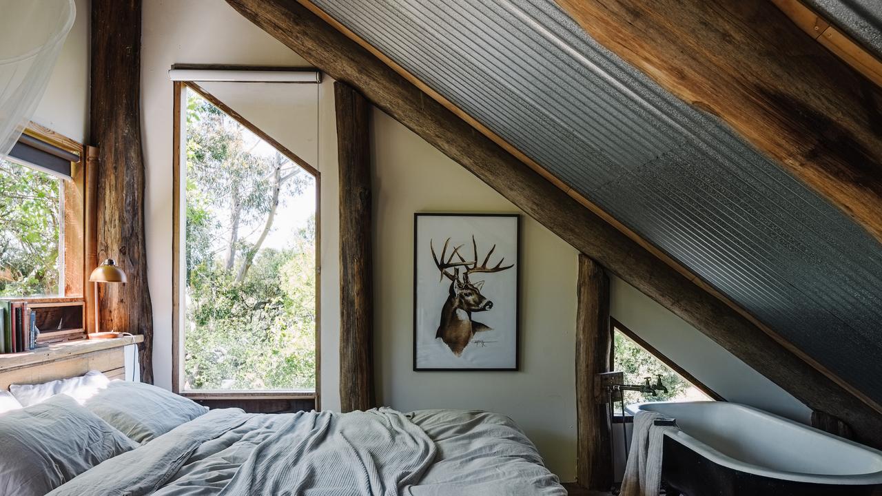 This home is as quirky as it is stylish with interiors featuring recycled materials and locally felled timber. There’s a freestanding clawfoot bath in the master bedroom, wood-fired heater, airconditioning, piano, coffee maker and pets are welcome.