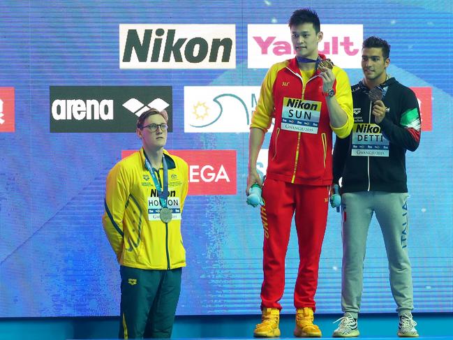 Mack Horton, left, refuses to share the podium with Sun Yang, centre, during the medal ceremony for the men's 400m freestyle final at the 2019 FINA World Championships in Gwangju, South Korea. Picture: Getty Images