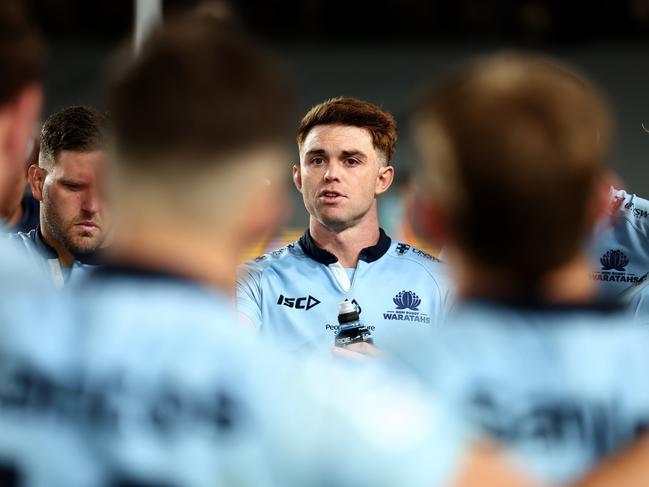 Waratahs flyer Andrew Kellaway talks to his teammates. Picture: Getty Images