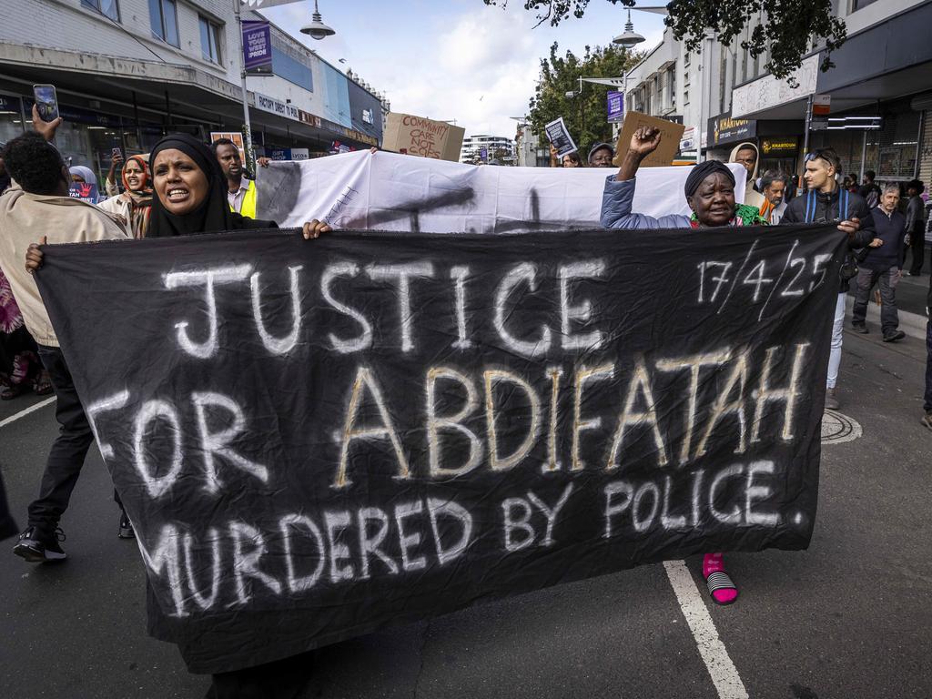 Protesters march through the streets following the shooting of Mr Ahmed. Picture: Jake Nowakowski