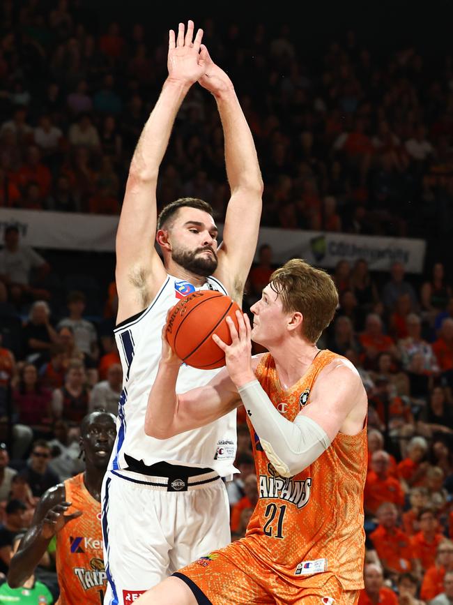 Taipans' Sam Waardenburg and Adelaide's Isaac Humphries go head to head in the National Basketball League (NBL) match between the Cairns Taipans and the Adelaide 36ers, held at the Cairns Convention Centre. Picture: Brendan Radke