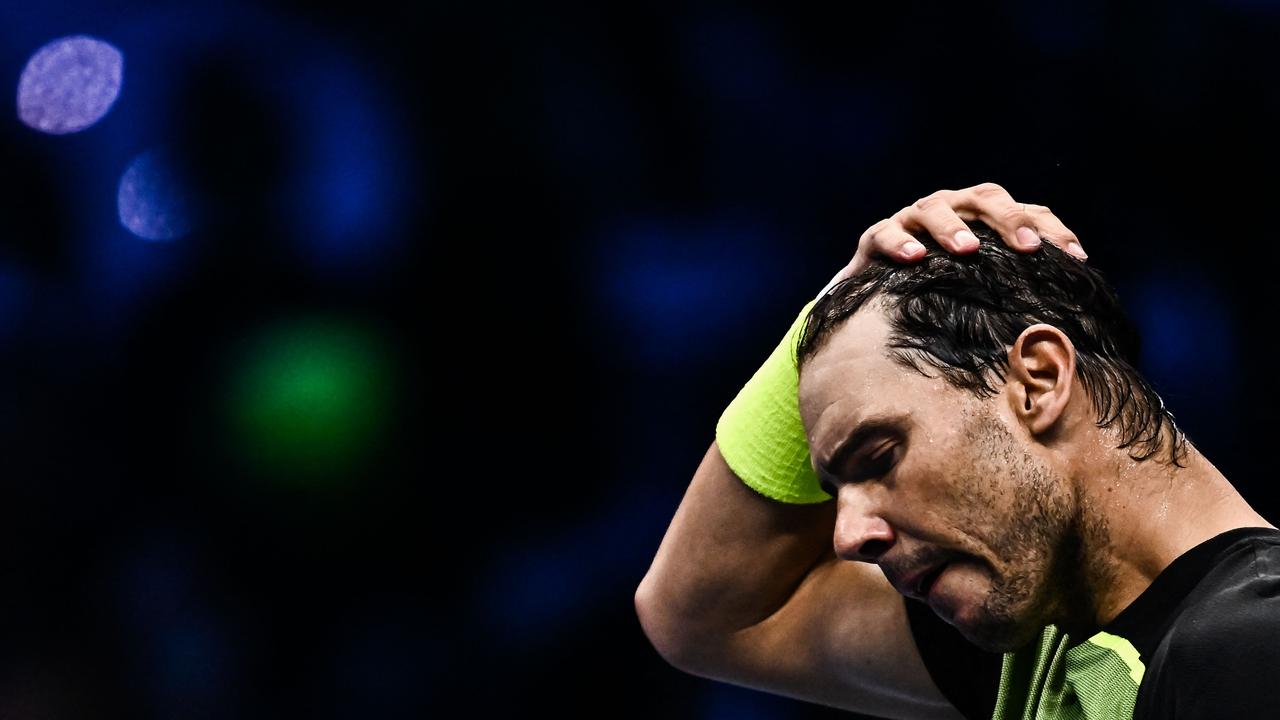 (FILES) Spain's Rafael Nadal reacts after winning his round-robin match against Norway's Casper Ruud on November 17, 2022 at the ATP Finals tennis tournament in Turin. – Rafael Nadal on May 5 withdrew from the Rome Masters tournament as he continues his recovery from injury, casting serious doubts over his fitness for the French Open. (Photo by Marco BERTORELLO / AFP)