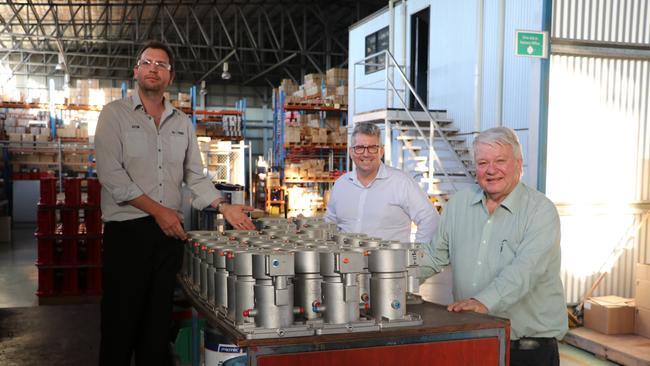 Minister Keith Pitt, Flynn MP Ken O'Dowd and Ausproof's Aston Marks at their Gladstone manufacturing facility. The company produces and exports high voltage connectors to mining companies globally.