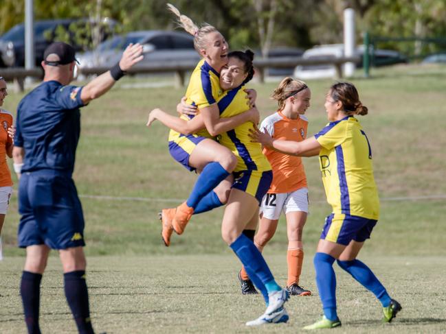 Gold Coast United's Deeanna Thompson (left) celebrates with Ellie Fryer after her opening goal against Brisbane Roar on Sunday. Picture: AGM Photography