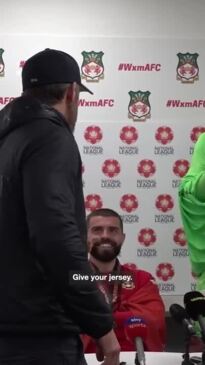 Ryan Reynolds crashes Wrexham postgame interview to demand jersey