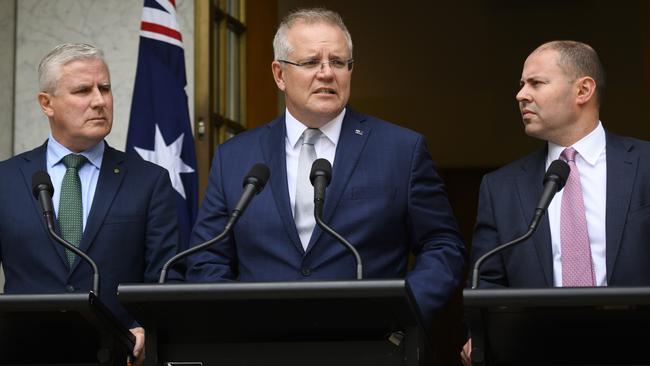 Prime Minister Scott Morrison with Deputy Prime Minister Michael McCormack Treasurer Josh Frydenberg at Parliament House. Picture: Getty Images