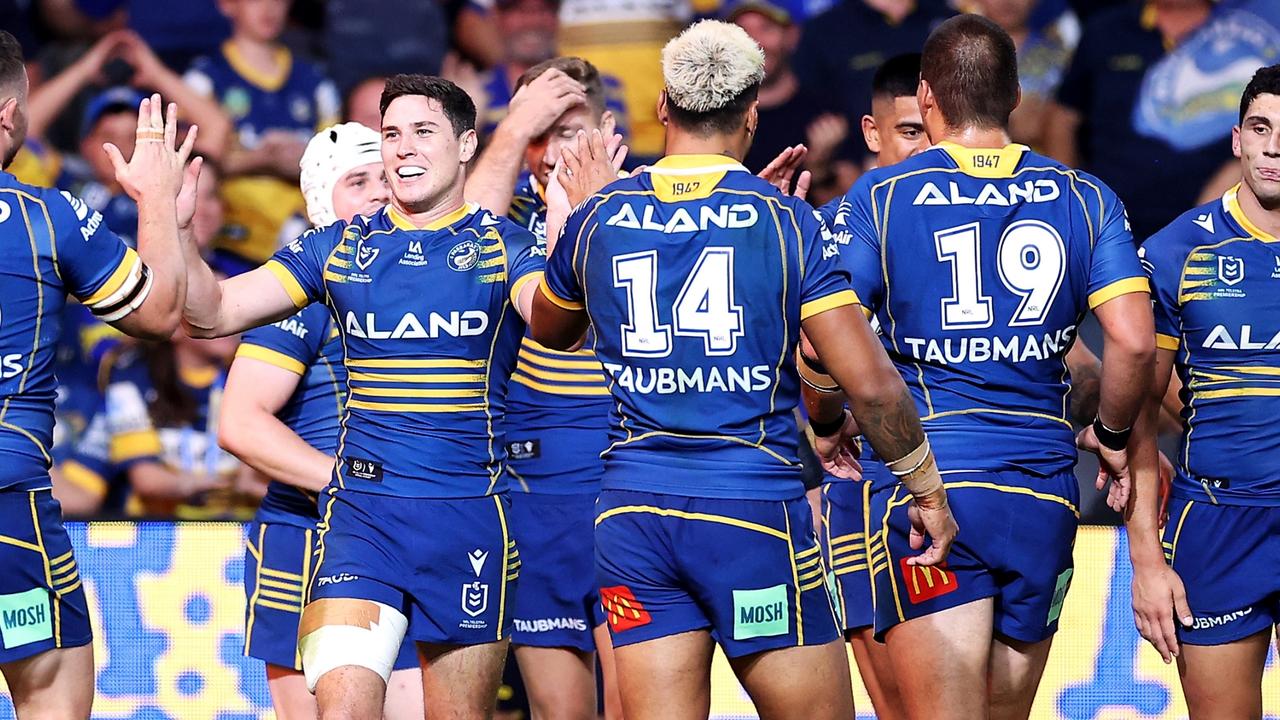 SYDNEY, AUSTRALIA - APRIL 03: Mitchell Moses of the Eels celebrates with his teammates after scoring a try during the round four NRL match between the Parramatta Eels and the St George Illawarra Dragons at CommBank Stadium, on April 03, 2022, in Sydney, Australia. (Photo by Mark Kolbe/Getty Images)