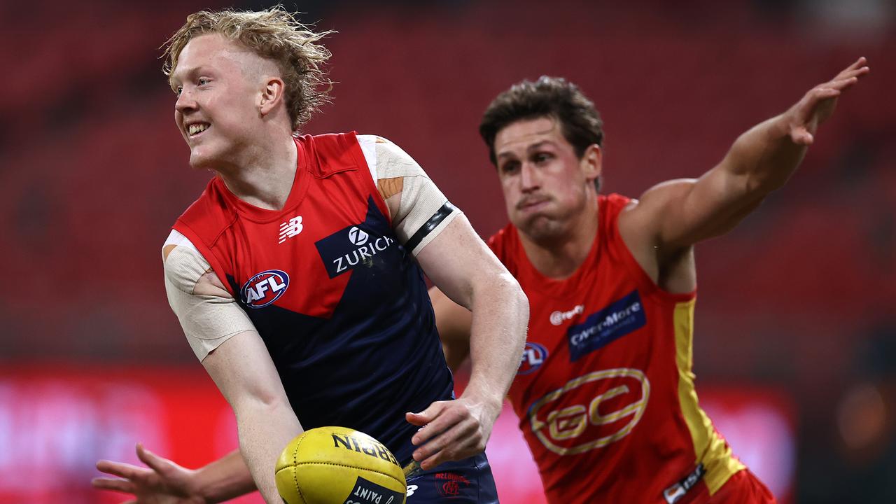 Clayton Oliver and David Swallow in last year’s Demons-Suns clash. Picture: Ryan Pierse/AFL Photos