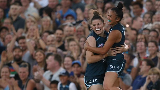 Darcy Vescio and Gabby O'Sullivan celebrate a goal Picture: Wayne Ludbey