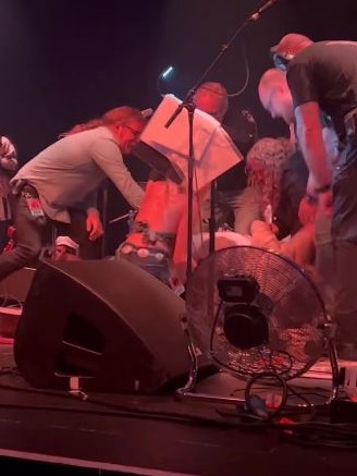 The pair began wrestling on the ground in front of the crowd. Picture: Instagram / @s6phiej9nes