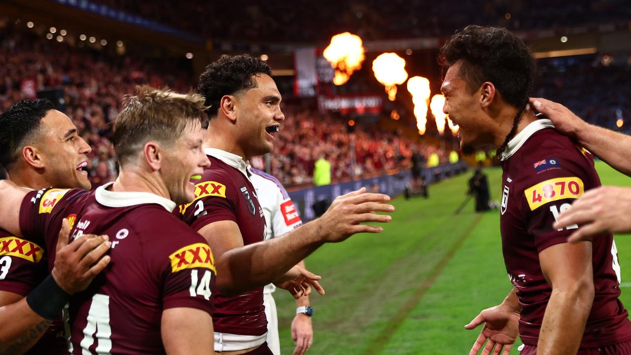 BRISBANE, AUSTRALIA - JUNE 21: Xavier Coates of the Maroons celebrates with teammates after scoring a try during game two of the State of Origin series between the Queensland Maroons and the New South Wales Blues at Suncorp Stadium on June 21, 2023 in Brisbane, Australia. (Photo by Chris Hyde/Getty Images)