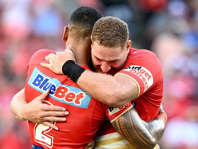 BRISBANE, AUSTRALIA - MARCH 05: Jamayne Isaako and Brenko Lee of the Dolphins celebrate victory after the round one NRL match between the Dolphins and Sydney Roosters at Suncorp Stadium on March 05, 2023 in Brisbane, Australia. (Photo by Bradley Kanaris/Getty Images)