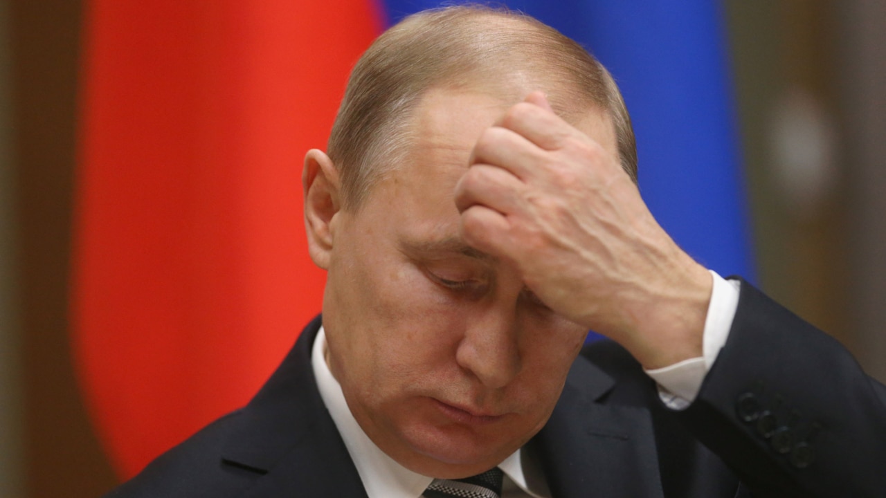 Vladimir Putin accused of breaking his own law