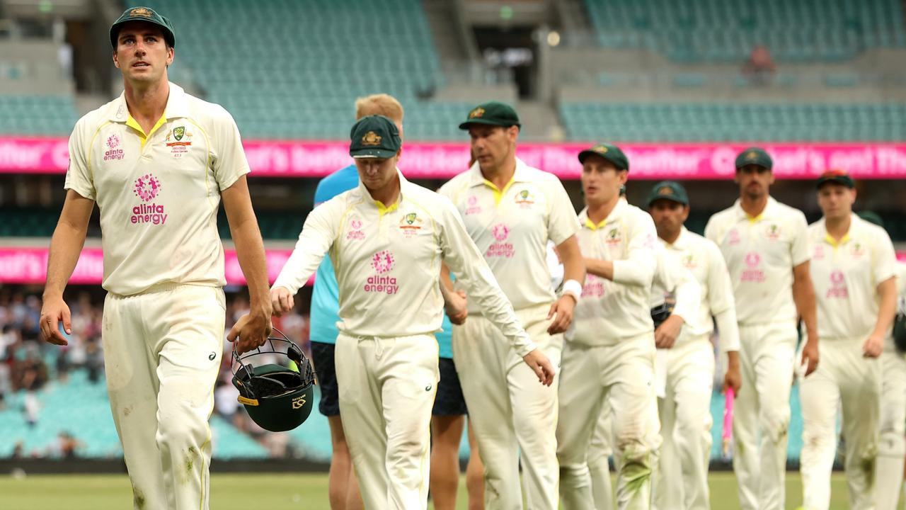 Pat Cummins leads his team off after Australia’s draw with England at the SCG. Picture: Getty Images