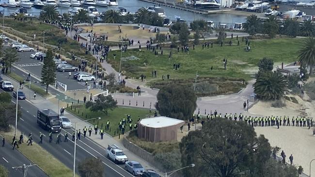 Police formed a wall to block protesters gathering at St Kilda beach. Picture: Supplied