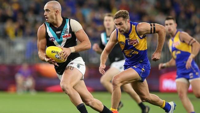 Sam Powell-Pepper and the Power get a jump on reigning premier West Coast at Optus Stadium in April. Picture: Paul Kane/Getty Images