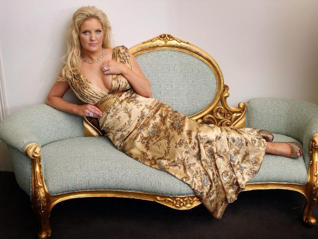 Brynne Gordon sent photographers into a frenzy with her grand entry at Monday night's Brownlow Medal. She opened her wardrobe to reveal more of her flamboyant range. Pictures: David Caird